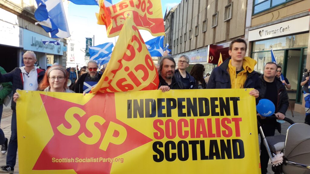 Members of the SSP behind a banner reading "independent socialist Scotland"