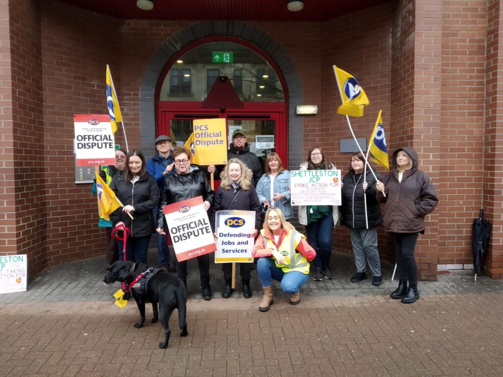 Striking PCS members hold a picket line in Glasgow